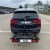 Aguri Active Bike PRO 4 czarny zamontowany na haku SUV-a, widok z tyłu na parkingu - Sklep motozebra