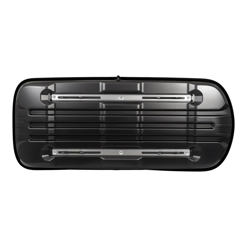 Box dachowy Inter Pack Traxer 5.6 antracyt - 370L – box zainstalowany na dachu samochodu, widok z boku w plenerze