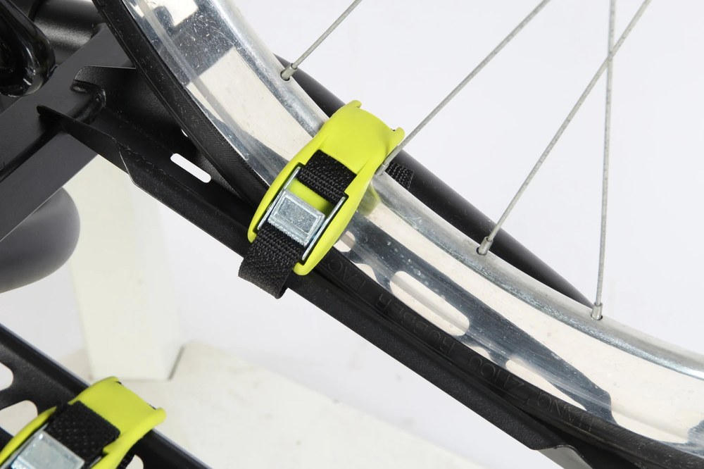 Inter Pack Quattro – detal paska kołowego: żółty uchwyt zaciskowy na kole roweru - Sklep motozebra