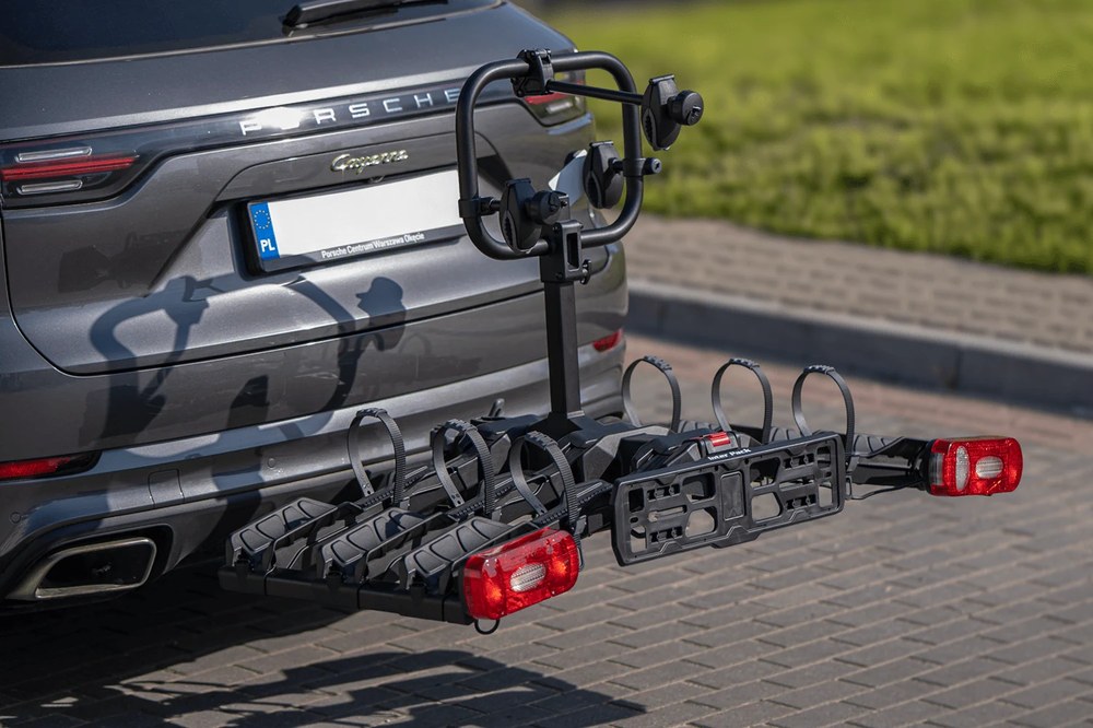 Inter Pack Spider 3 Lite zamontowany na haku SUV-a, widok z boku, złożony bez rowerów - Sklep motozebra