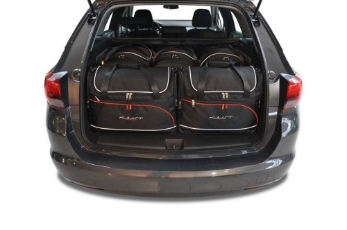 Przejdź do produktu Torby do bagażnika Opel Astra Sports Tourer K (B16) 2016–2021 – zestaw KJUST AERO 5 szt., 7031021