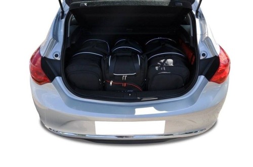 Przejdź do produktu Torby do bagażnika Opel Astra Hatchback 5D J (P10) 2009–2015 – zestaw KJUST AERO 4 szt., 7031026