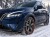 Grafika AI: Granatowy SUV z łańcuchami śniegowymi Campcar KNS 95 9 mm na śniegu - Sklep motozebra
