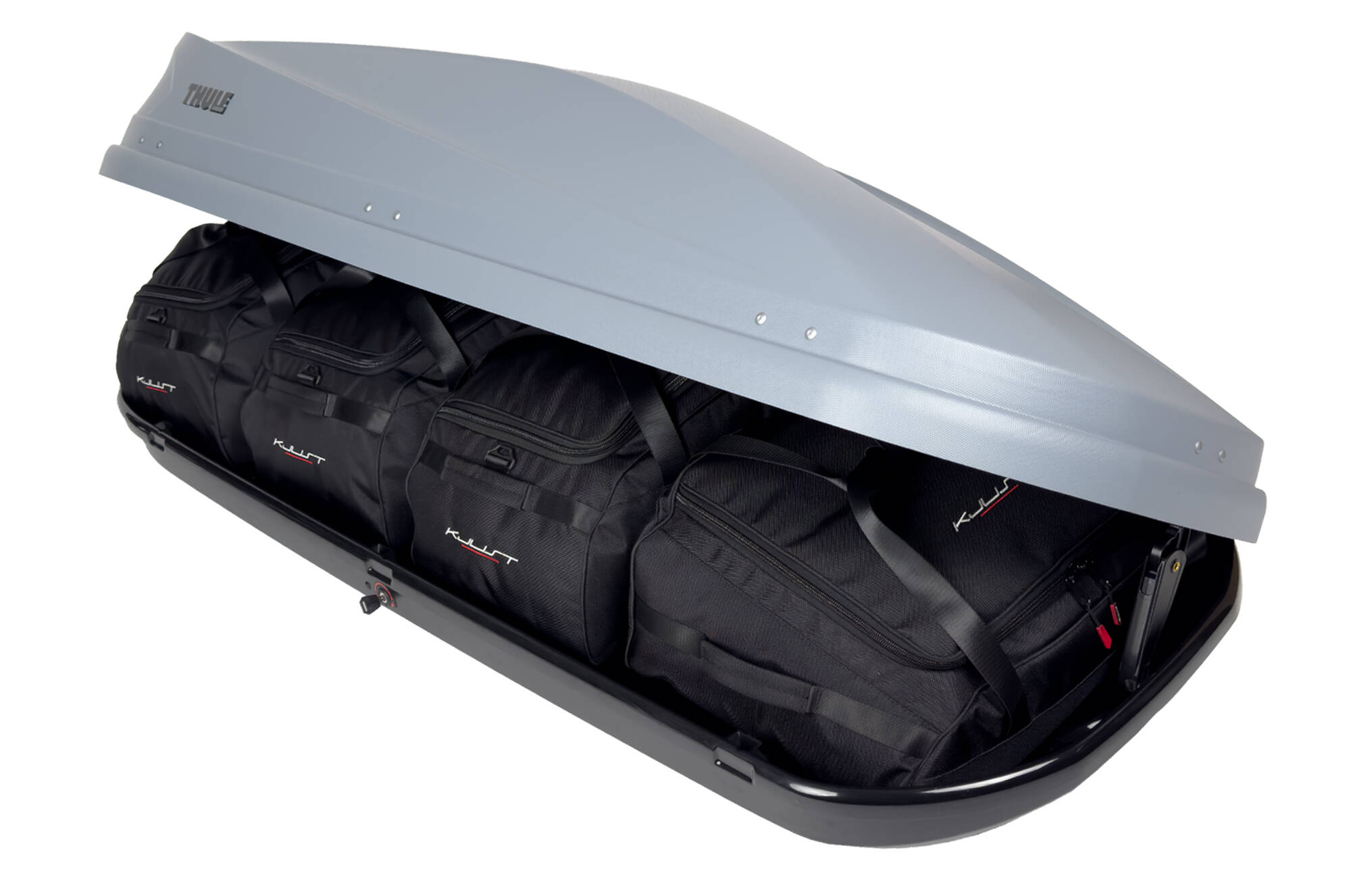 Torby KJUST do boksu dachowego Thule Touring L — torby ułożone w boksie