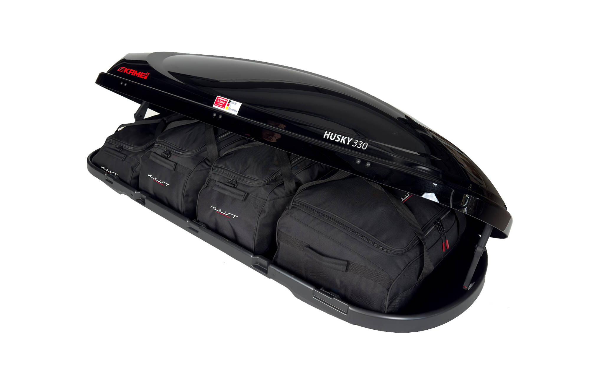 Torby KJUST do boksu dachowego Kamei Husky 330 — torby ułożone w boksie