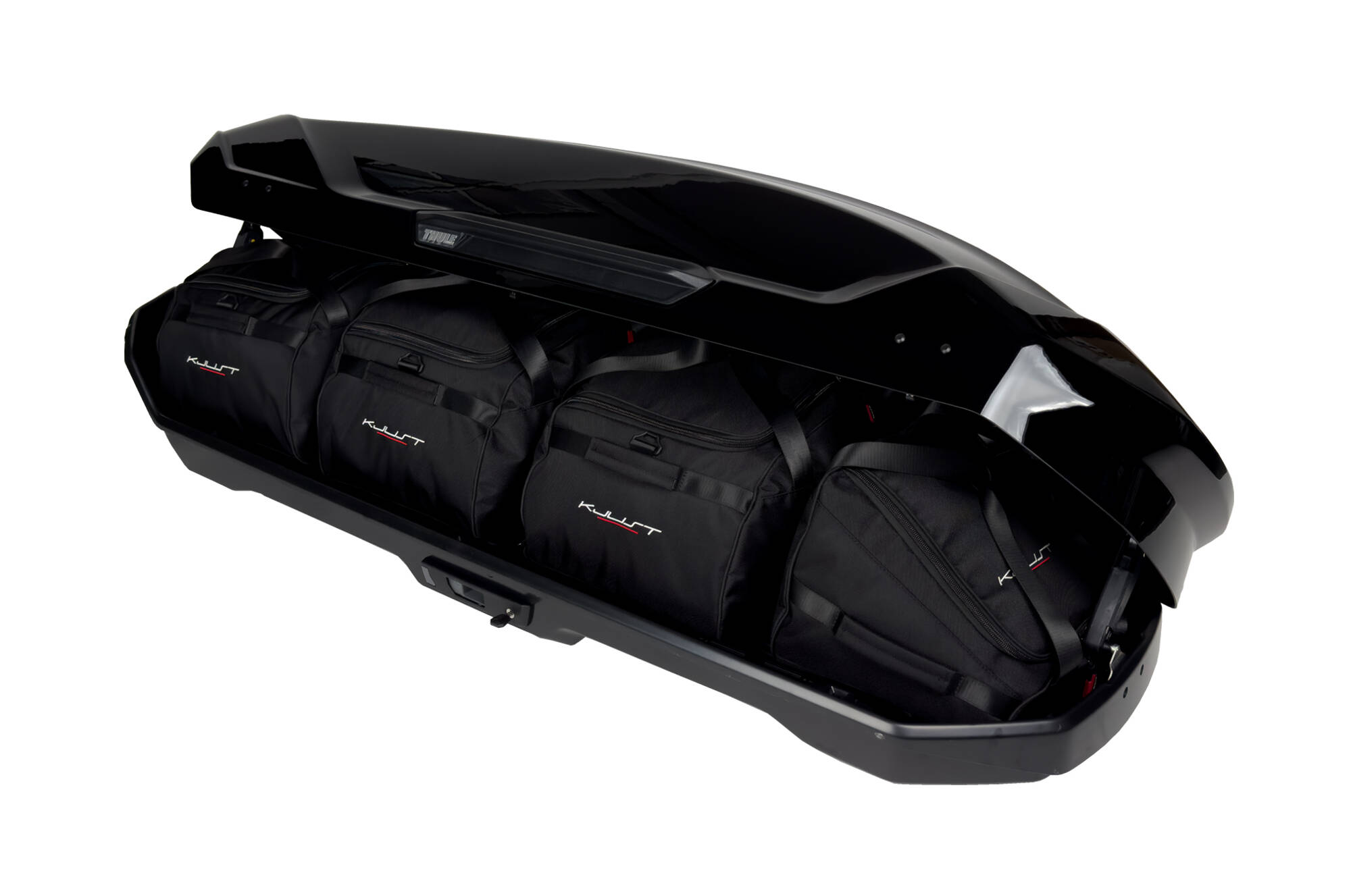 Torby KJUST do boksu dachowego Thule Motion 3 Sport — torby ułożone w boksie