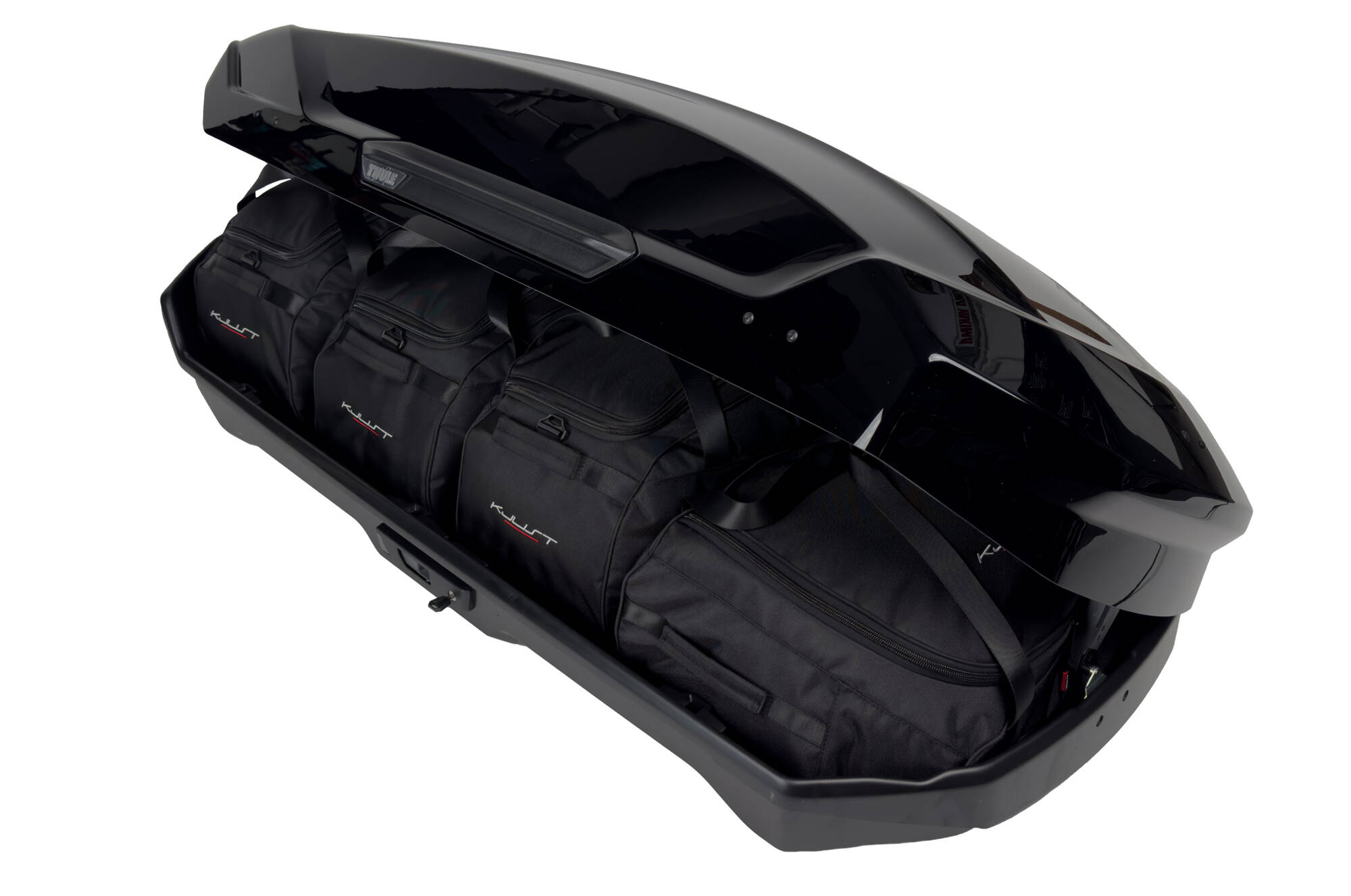 Torby KJUST do boksu dachowego Thule Motion 3 M — torby ułożone w boksie