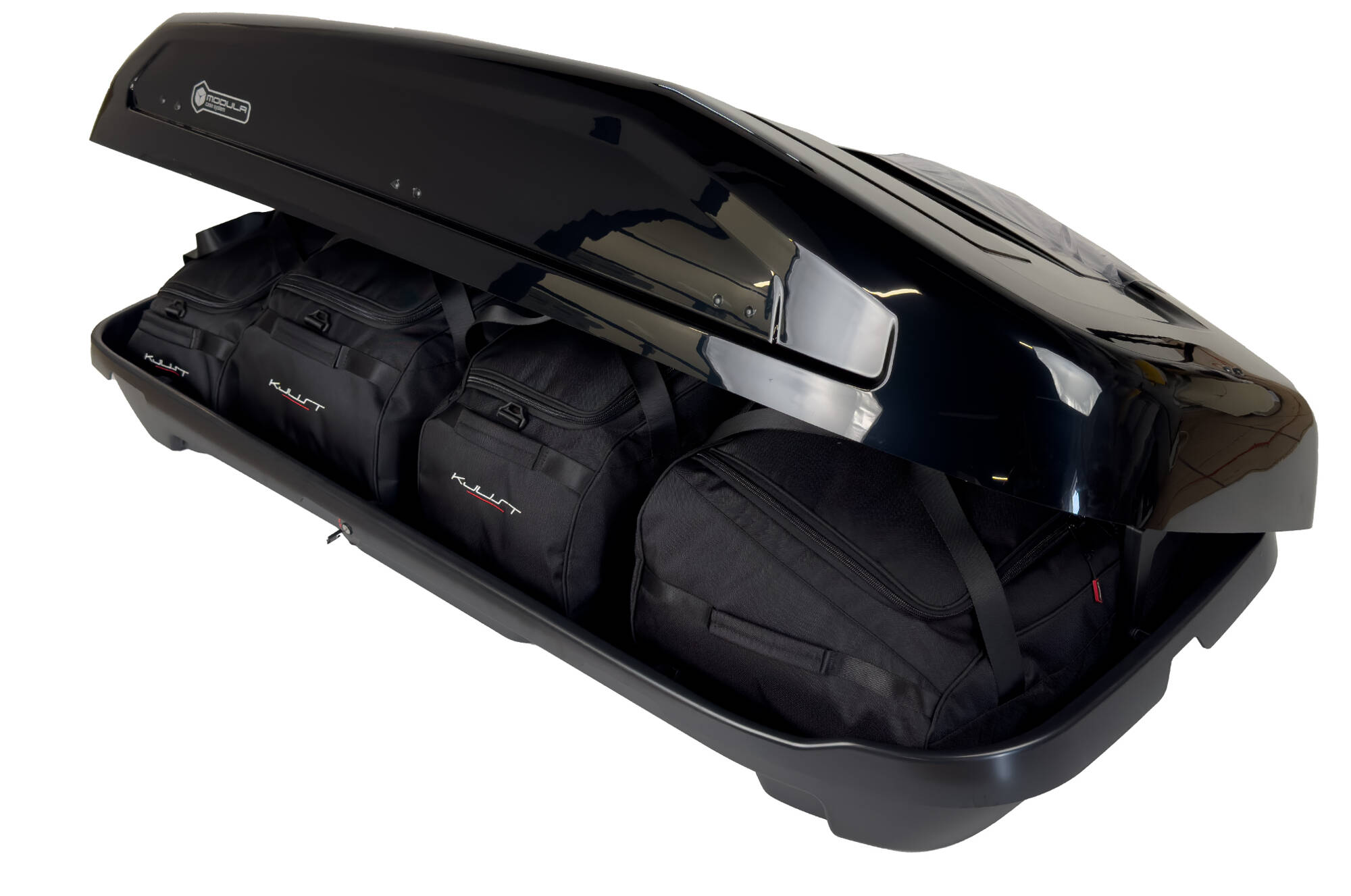 Torby KJUST do boksu dachowego Modula EVO 470 — torby ułożone w boksie