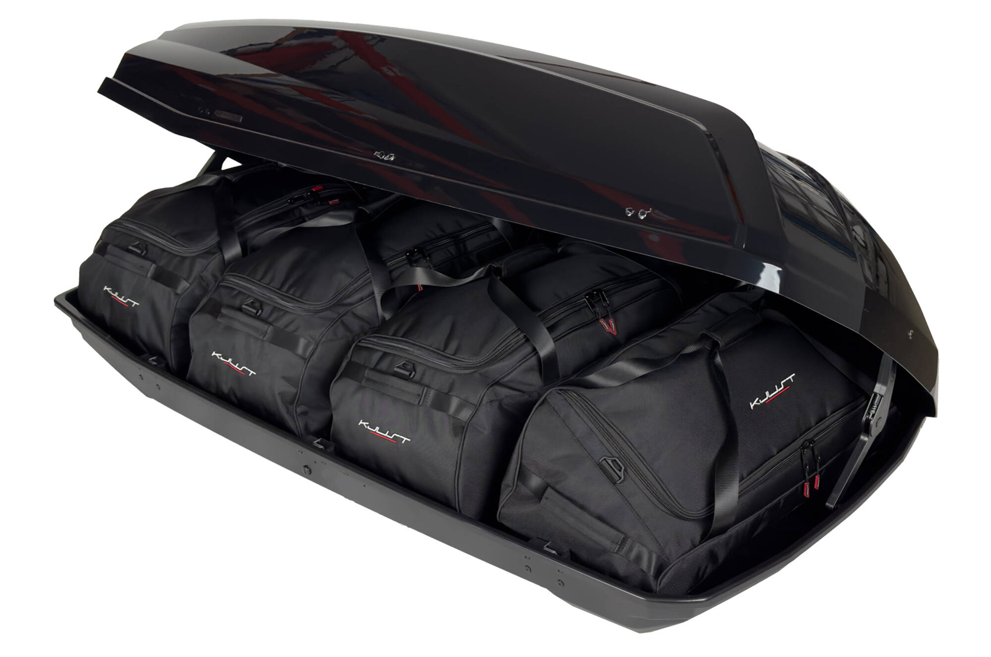 Torby KJUST do boksu dachowego GP Rapture 520 — torby ułożone w boksie