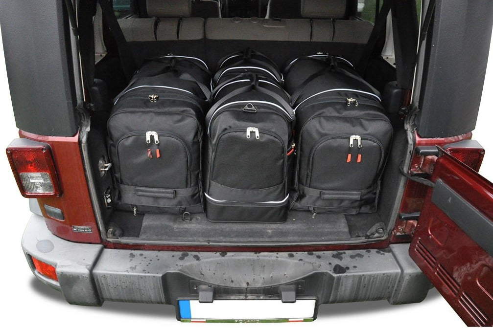 Torby KJUST SPORT do Jeep Wrangler Unlimited III (JK) — zestaw ułożony w bagażniku