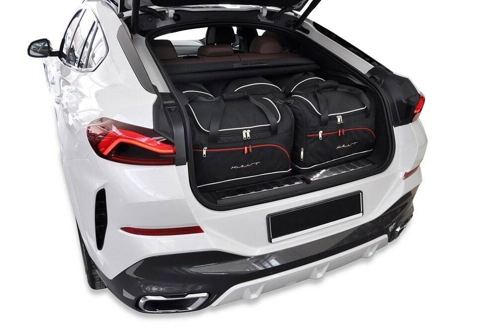Torby KJUST SPORT do BMW X6 / X6 M G06 — zestaw ułożony w bagażniku