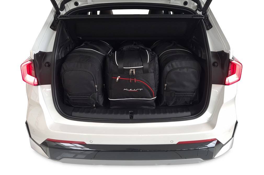 Torby KJUST SPORT do BMW X1 U11 — zestaw ułożony w bagażniku