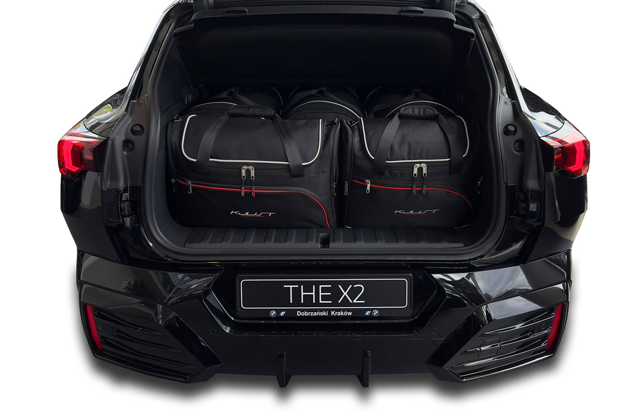 Torby KJUST AERO do BMW iX2 U10 — zestaw ułożony w bagażniku