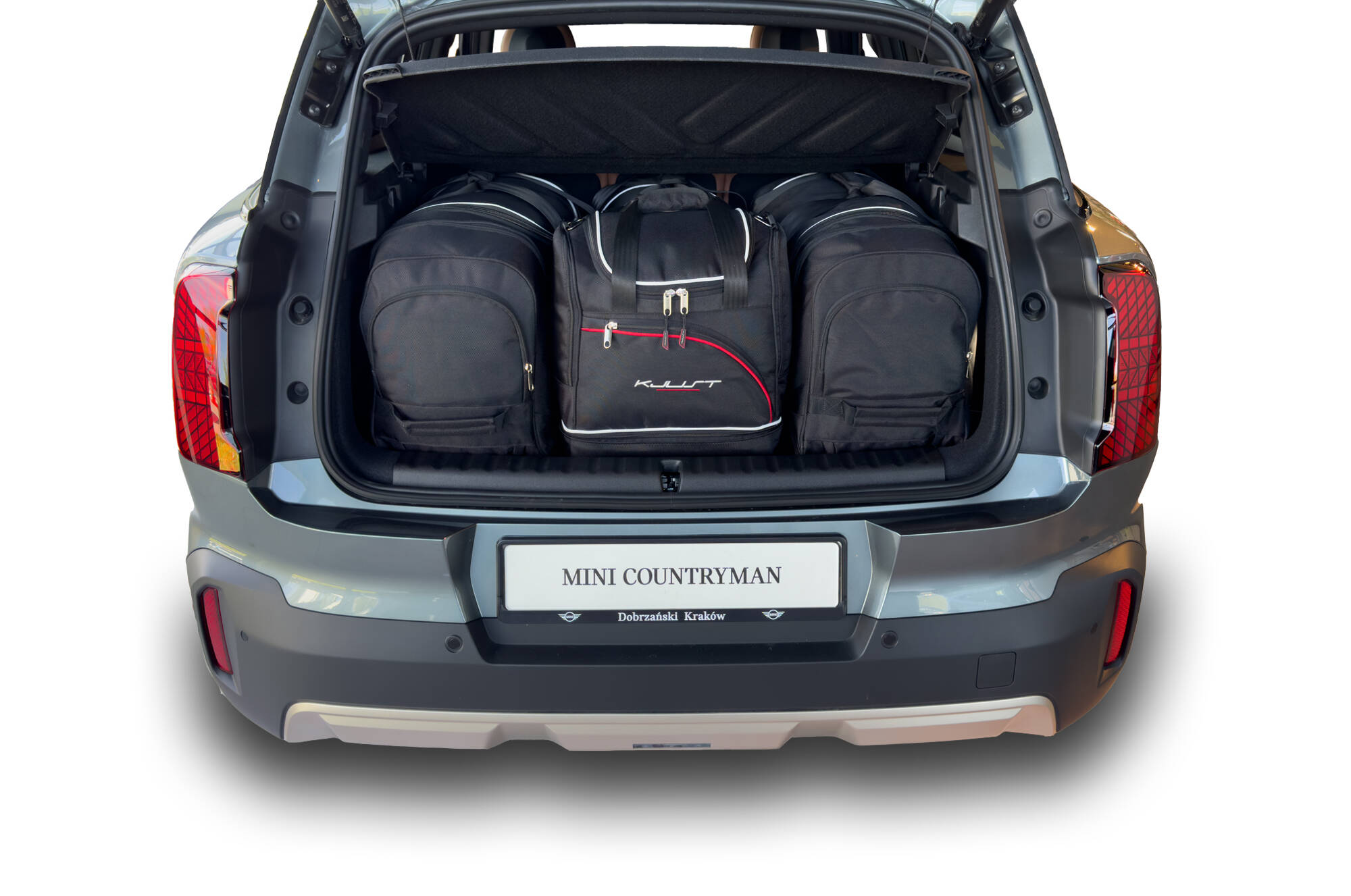 Torby KJUST SPORT do Mini Countryman EV U25 — zestaw ułożony w bagażniku