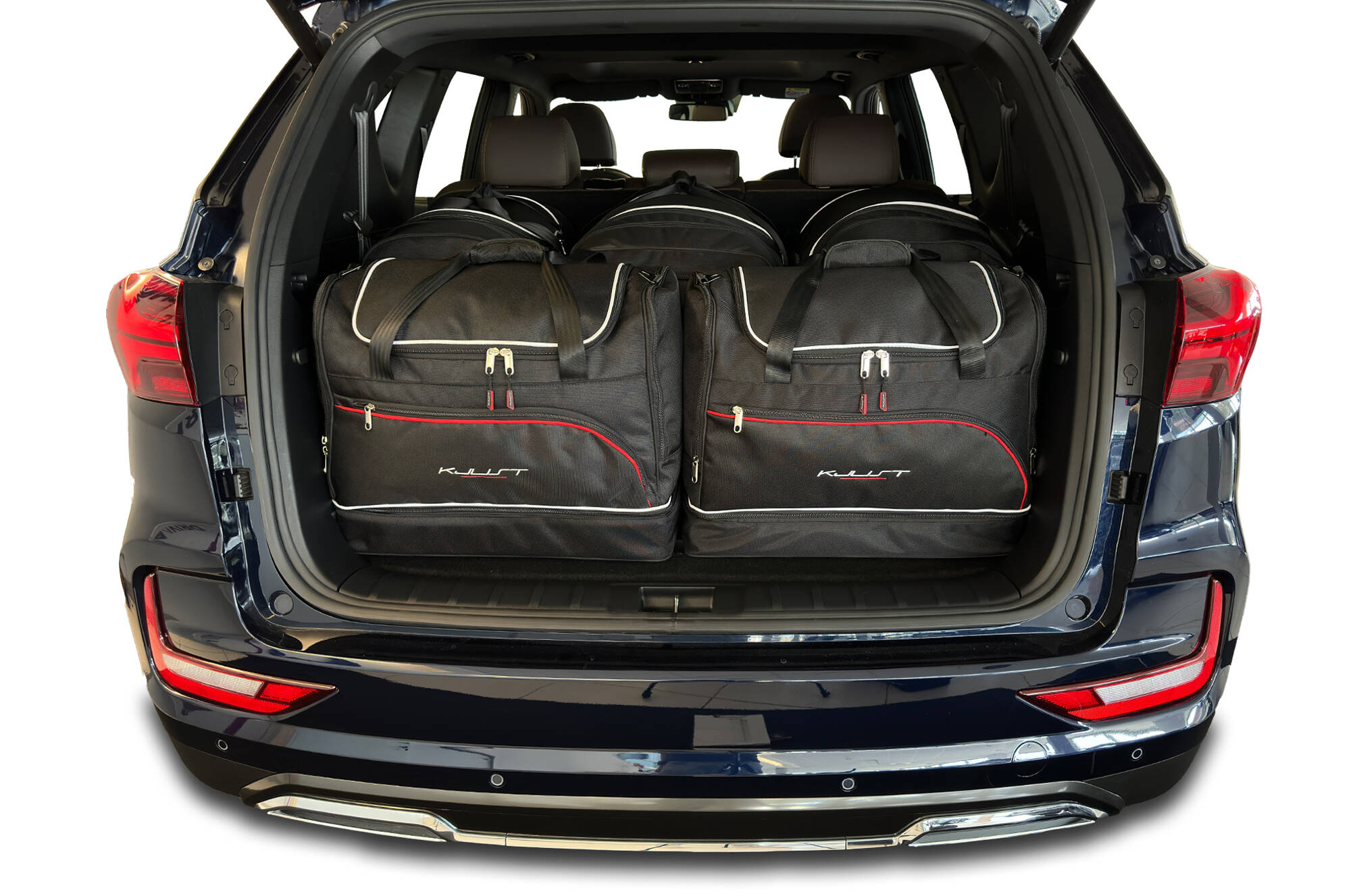 Torby KJUST SPORT do Ssangyong Rexton IV — zestaw ułożony w bagażniku