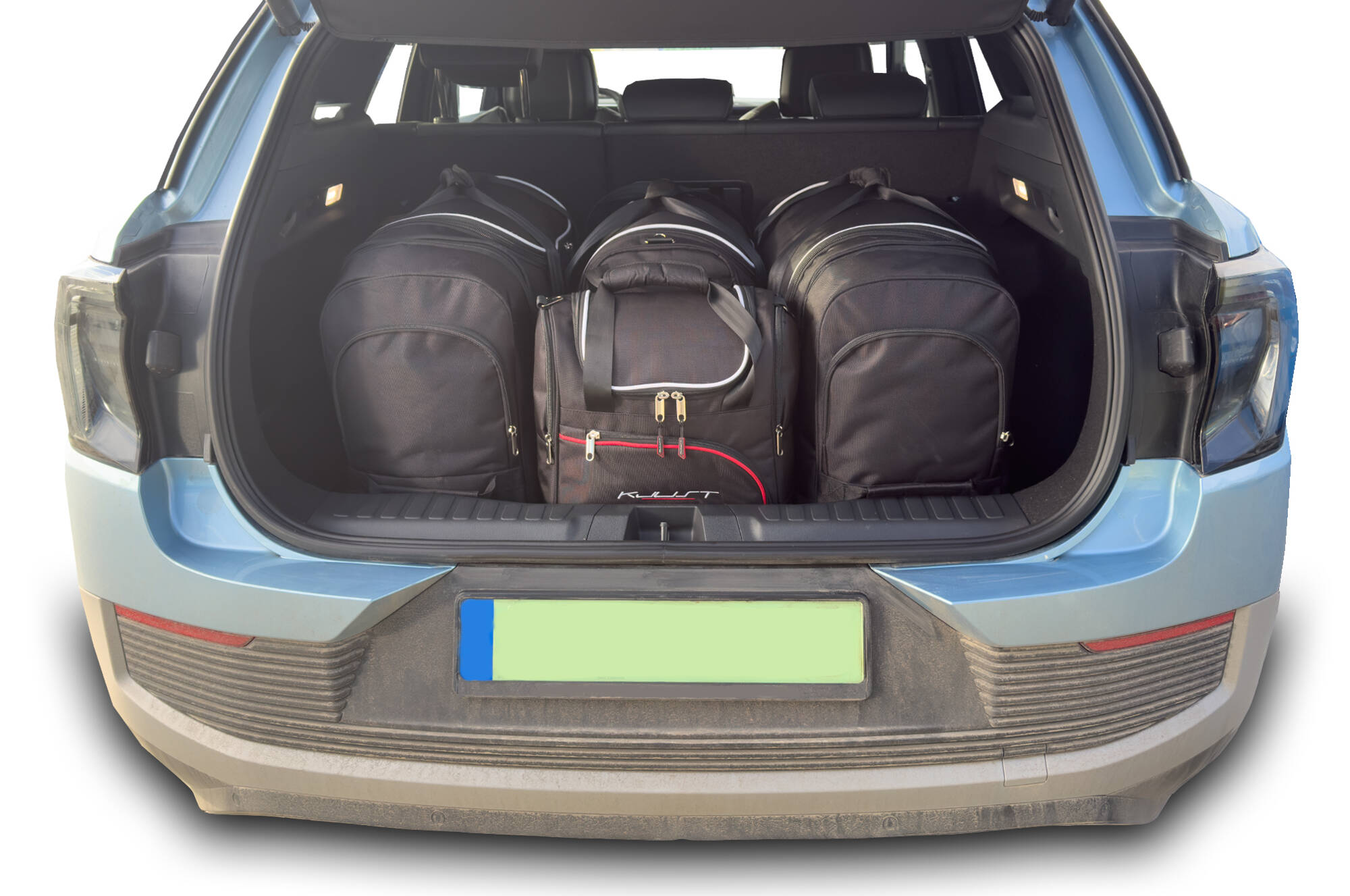 Torby KJUST SPORT do Ford Explorer Electric VI — zestaw ułożony w bagażniku
