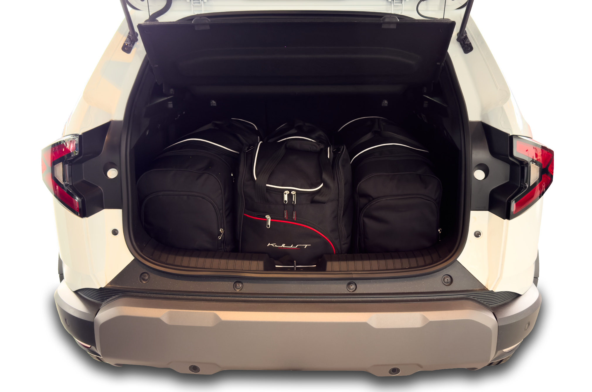 Torby KJUST SPORT do Dacia Duster III — zestaw ułożony w bagażniku